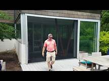 Video thumbnail for Phantom Screens XL Retractable Screen Door for Large Opening