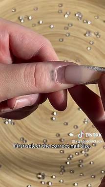 Video thumbnail for Make a statement with KISS Classy Premium Nails in the style Sophisticated 💎 An elegant combination of modern French tip paired with trendy jewel accents. This DIY French mani with a modern flair is totally on trend! Available now at @superdrug. #KISSnailsUK #FrenchNails #FrenchTips #NailInspo