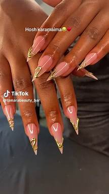 Video thumbnail for Stunning Chrome Stiletto Nails for 2025