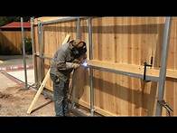 Video thumbnail for building a 7ft cedar fence with 2 sliding gates