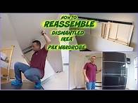 Video thumbnail for Ikea Pax Wardrobe sliding doors reassembling second time.