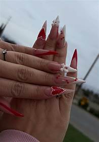 Video thumbnail for Stunning Stiletto Acrylic Nails with Heart Designs