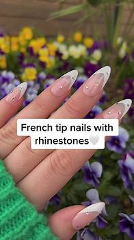 Video thumbnail for I loooove these almond french tip nails with rhinestones ✨ these would be so perfect for bridal events or a classy everyday look 🤍 Go to the link in bio to order a set of custom press on nails. A set like this costs $40 and includes 3 extra sizes for a perfect fit💅🏼 #pressonnails #nailinspo #nailtrends #bridaltiktok #bridalnails #beauty #nails💅 #naildesigns #frenchtipnails #whitenailart #bachelorette #bachelorettenails #bridenails #summernails #springnails