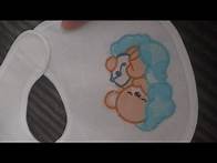 Video thumbnail for machine embroidery on a baby bib