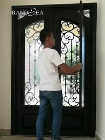Video thumbnail for Residential exterior wrought iron double security entry front doors